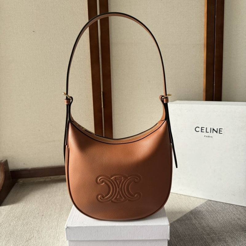 Ce**e top handle bags